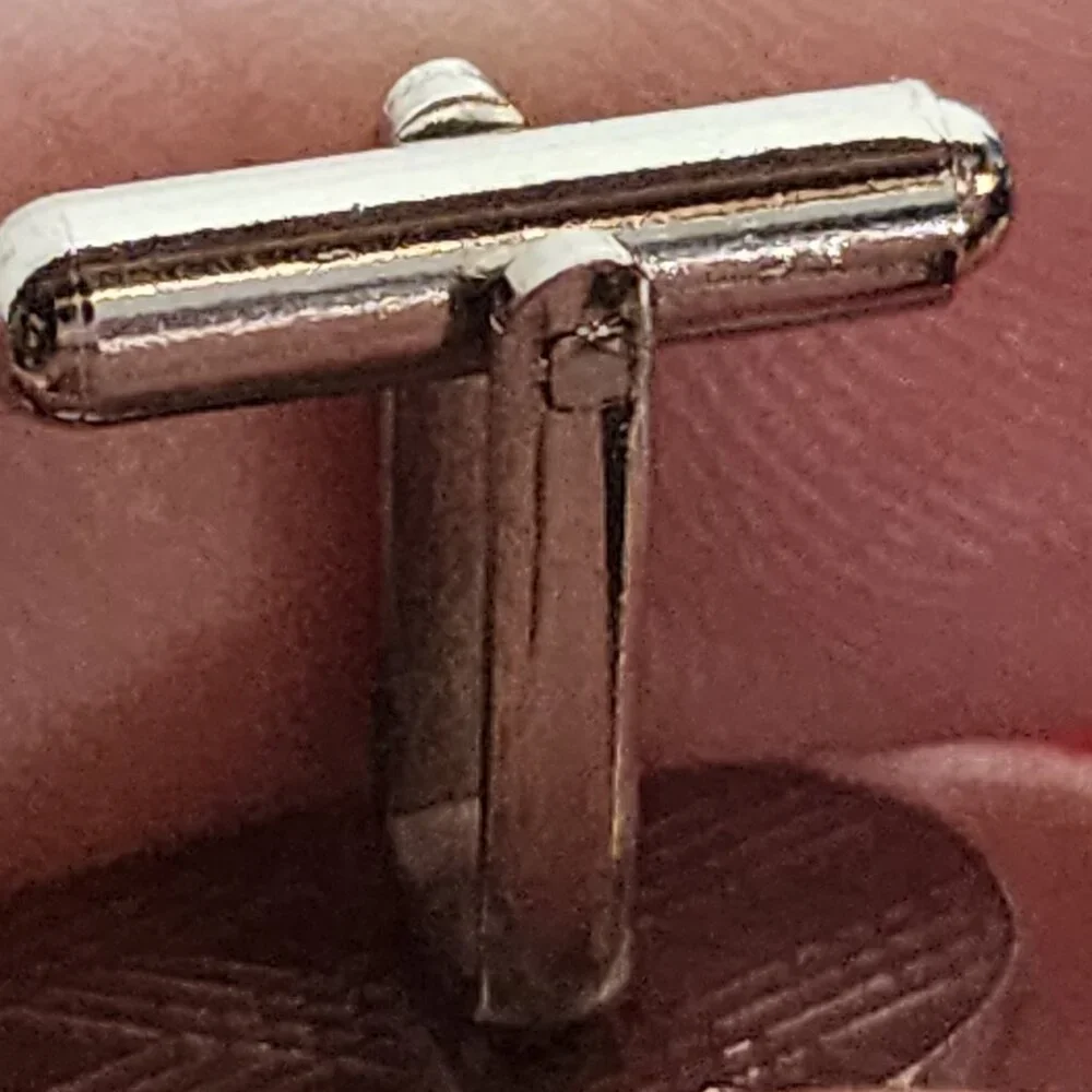 Source Unknown minimalist silver